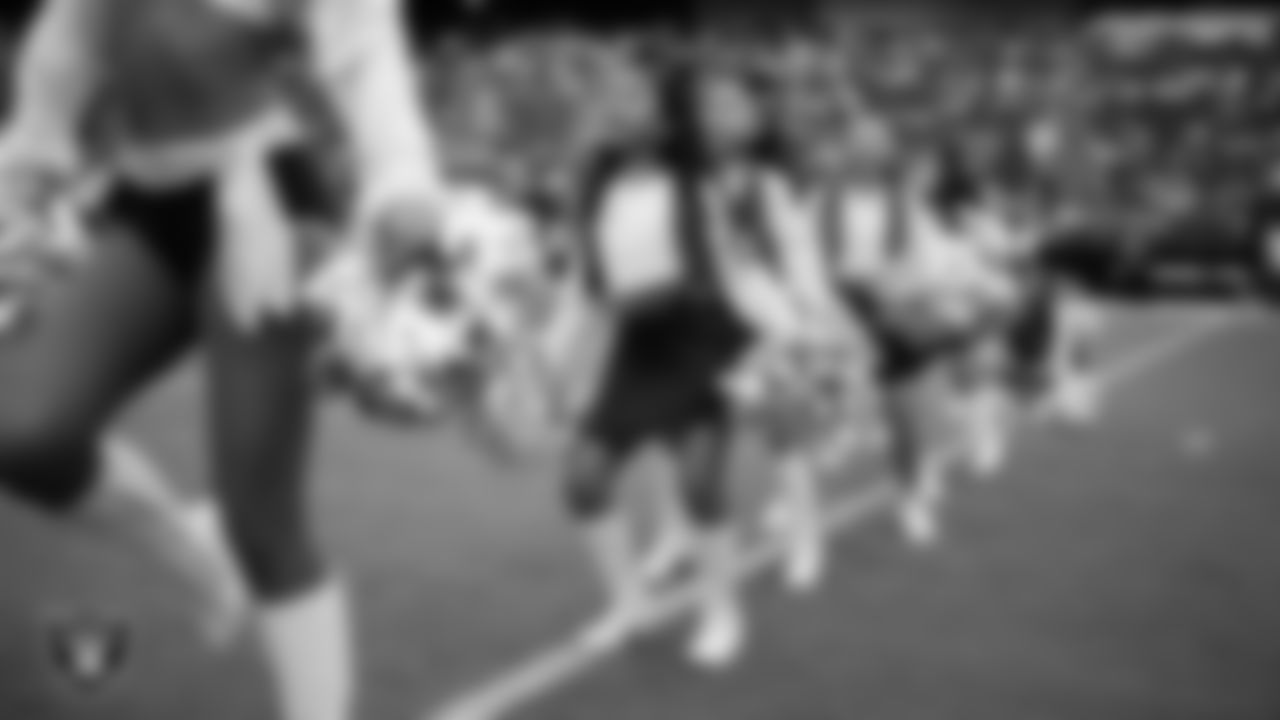 Junior Raiderettes perform on the field before the preseason home game against the San Francisco 49ers at Allegiant Stadium.
