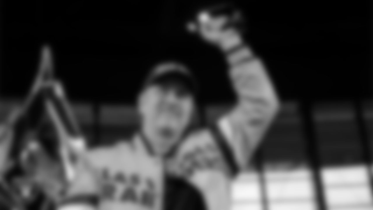 Las Vegas Raiders fan and Guinness World Record holder Brian Fowler lights the Al Davis Memorial Torch before the Las Vegas Raiders' regular season home game against the Kansas City Chiefs at Allegiant Stadium.