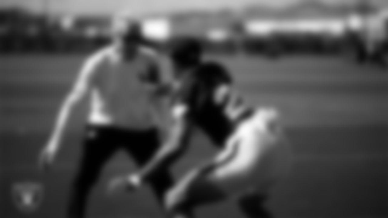 Las Vegas Raiders Head Coach Pete Carroll and safety Isaiah Pola-Mao (20) at a workout during phase two of the offseason program at Intermountain Health Performance Center.
