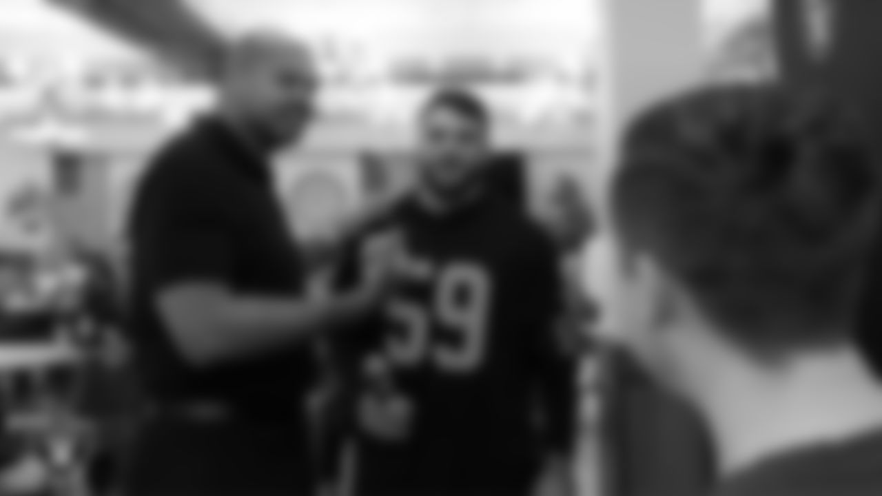 Las Vegas Raiders alumnus Grant Irons and linebacker Jon Rhattigan (59) during the annual Cox Salute to Service Tailgate at Southern Nevada State Veterans Home.