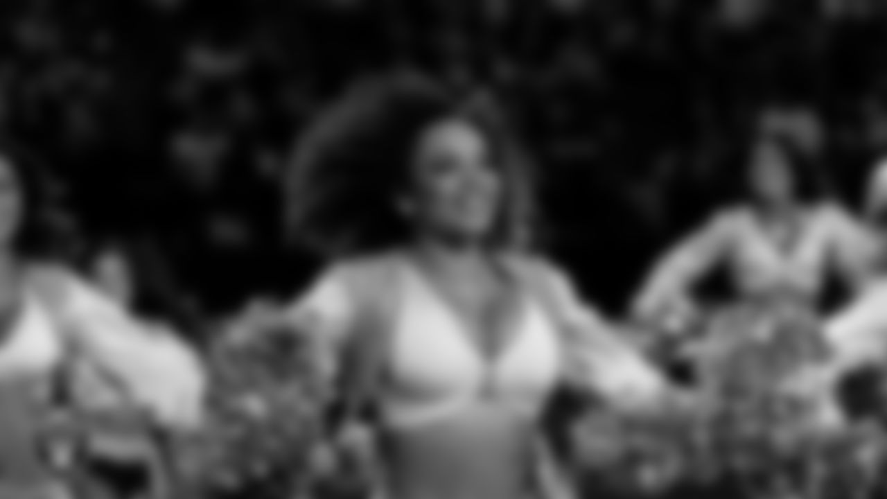 Raiderette Makenna walks onto the field for a performance during the regular season home game against the Kansas City Chiefs at Allegiant Stadium.