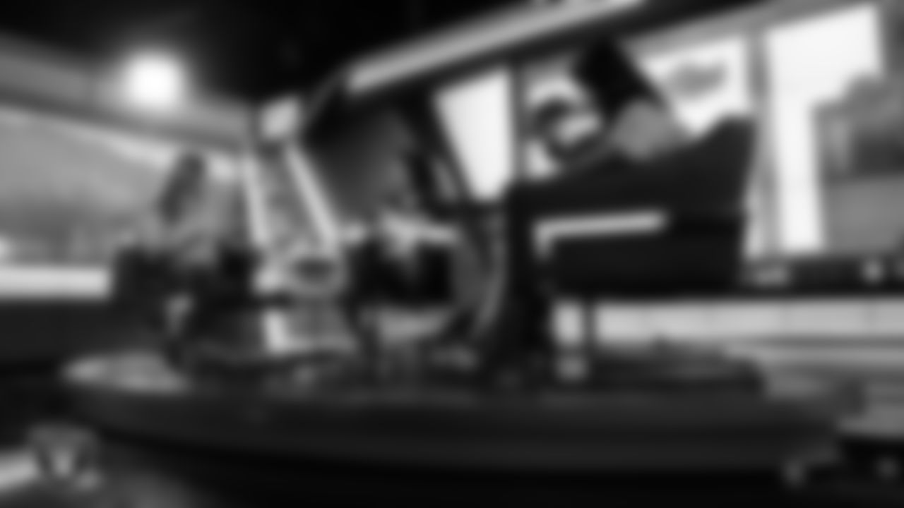 Las Vegas Raiders cornerback Darien Porter (26) works with representatives from The Shade Tree and designers to design cleats for My Cause My Cleats in Cox Studios at Intermountain Health Performance Center.