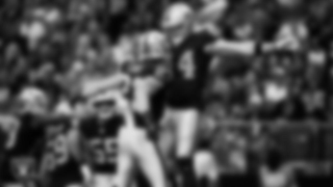 Las Vegas Raiders running back Dylan Laube (23) celebrates with linebacker Tommy Eichenberg (44) after making a tackle during the regular season home game against the Tennessee Titans at Allegiant Stadium.