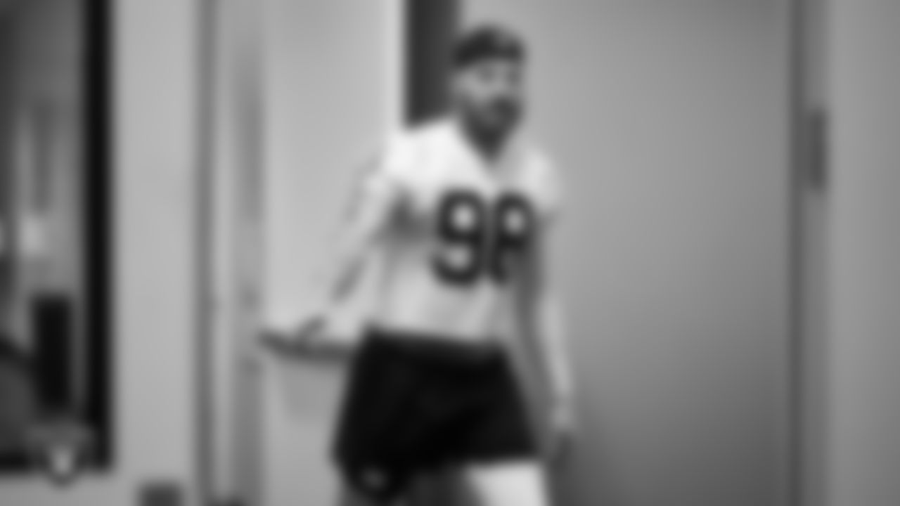 Las Vegas Raiders defensive end Maxx Crosby (98) walks out to the field for practice at Intermountain Health Performance Center.