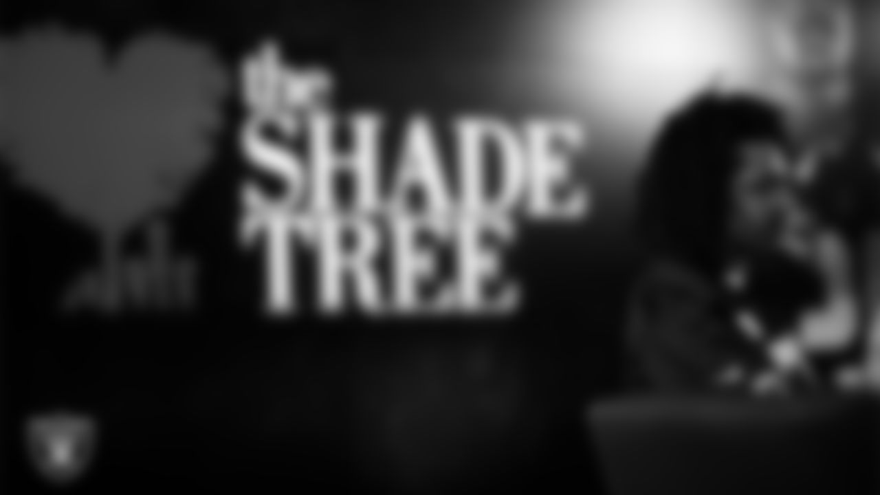 Las Vegas Raiders cornerback Darien Porter (26) works with representatives from The Shade Tree and designers to design cleats for My Cause My Cleats in Cox Studios at Intermountain Health Performance Center.