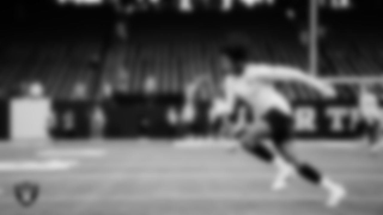 Las Vegas Raiders cornerback Darien Porter (26) warming up before the regular season away game against the Indianapolis Colts at Lucas Oil Stadium.