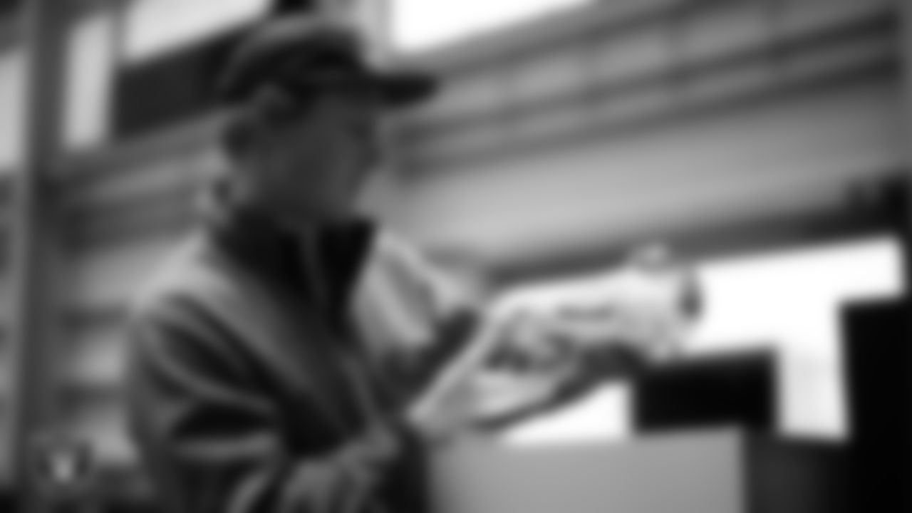 Las Vegas Raiders kicker Daniel Carlson (8) unboxes his custom cleats for the NFL's My Cause My Cleats initiative at Intermountain Health Performance Center.