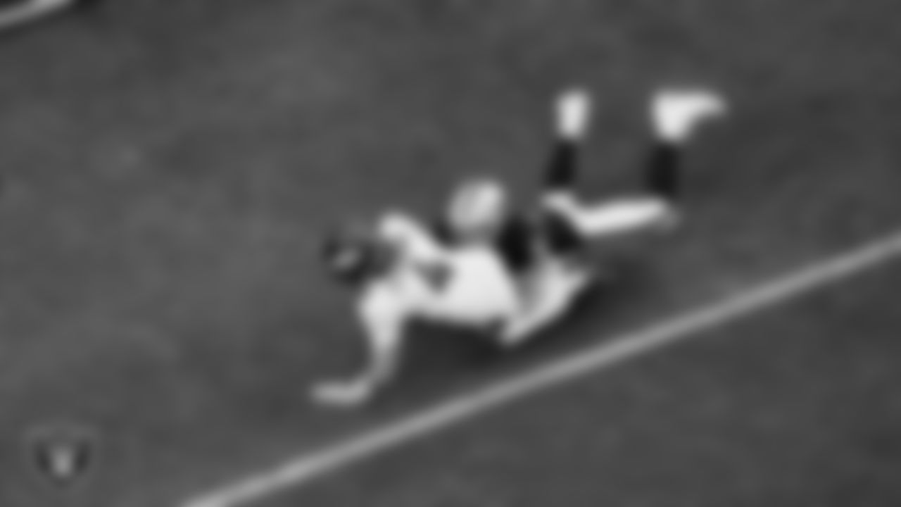 Las Vegas Raiders defensive end Maxx Crosby (98) sacks the quarterback during the regular season home game against the Denver Broncos at Allegiant Stadium.