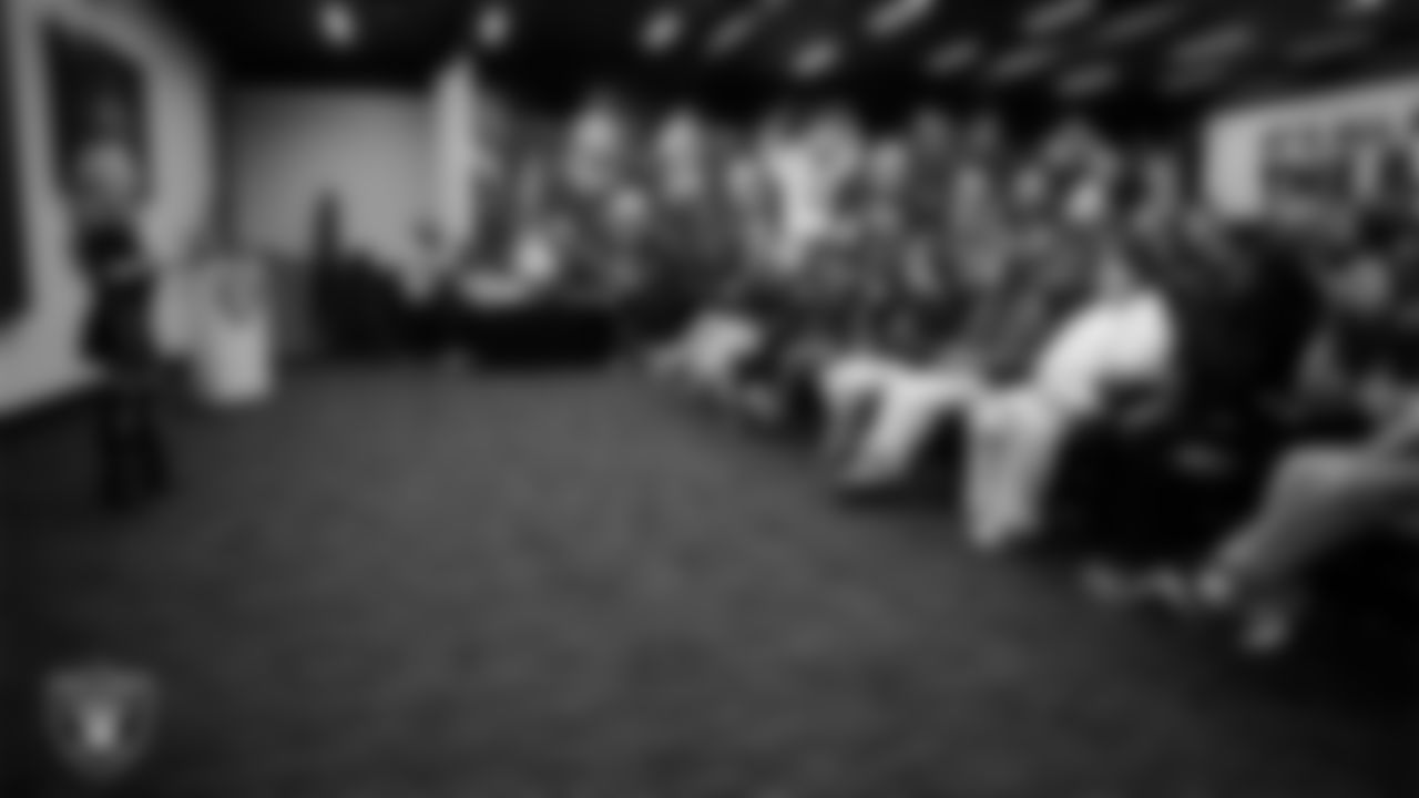 Ellie Naqvi from Naqvi Injury Law speaks to athletes from Clark High School and Chaparral High School at Intermountain Health Performance Center.