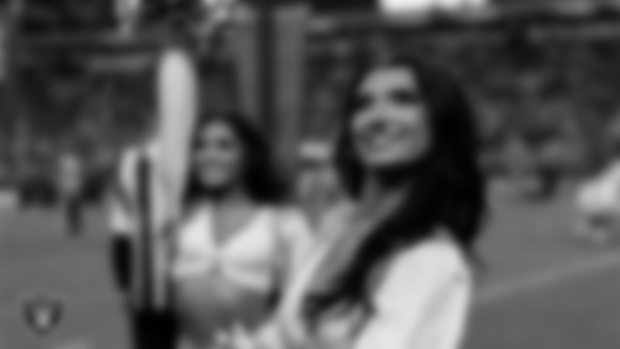 Raiderette Kylee on the sidelines during the regular season home game against the Denver Broncos at Allegiant Stadium.