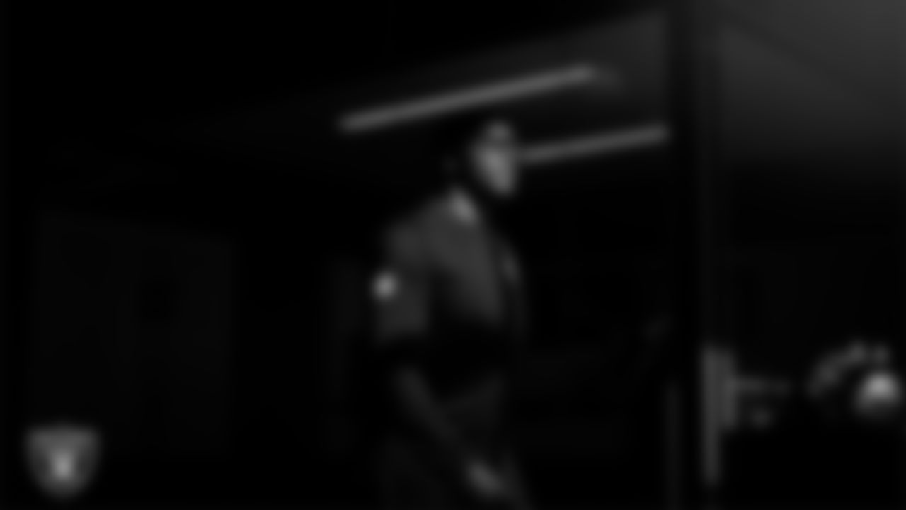 Las Vegas Raiders running backs coach Deland McCullough walks out to the field for practice at Intermountain Health Performance Center.