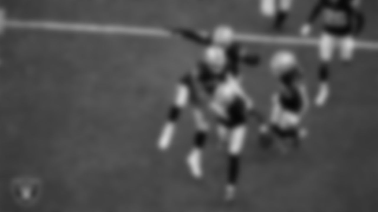 Las Vegas Raiders safety Jeremy Chinn (11) celebrates with teammates after intercepting a pass during the preseason home game against the San Francisco 49ers at Allegiant Stadium.