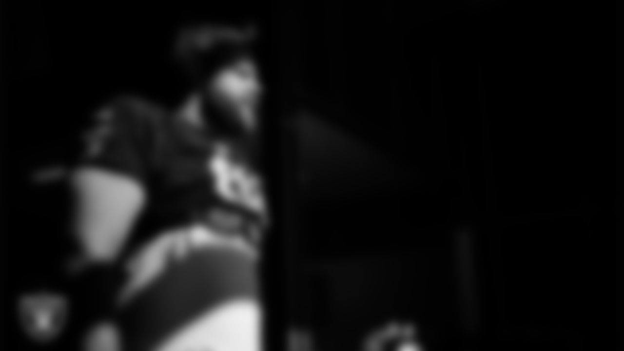 Las Vegas Raiders center/guard Jordan Meredith (61) walks out to the field for practice at Intermountain Health Performance Center.