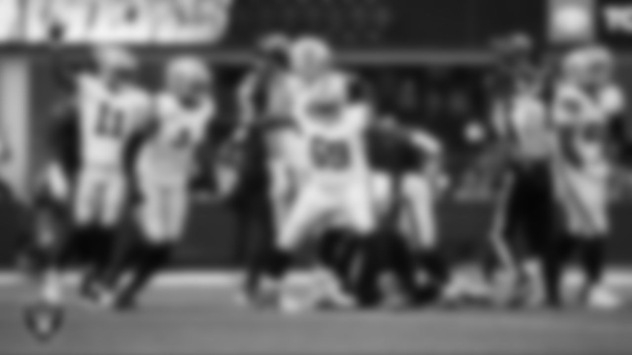 Las Vegas Raiders defensive tackle Adam Butler (69) celebrates after making a tackle during the regular season away game against the Los Angeles Chargers at SoFi Stadium.