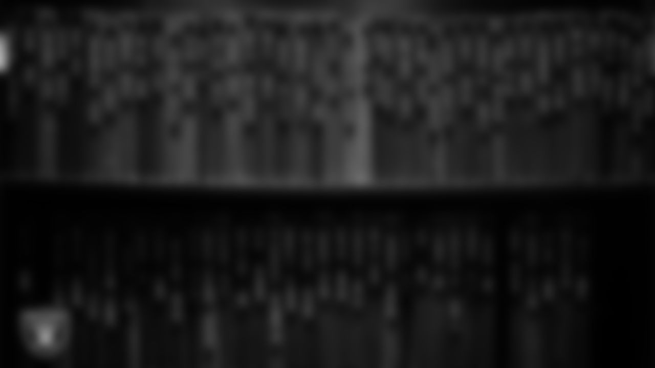 Workout logs in the weight room during practice at Intermountain Health Performance Center.