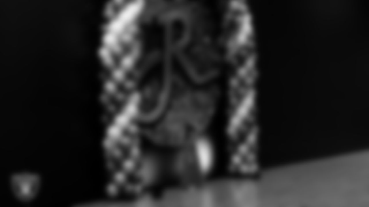 An attendee poses for a photo during the Valentine's Day Dance at The Studio.