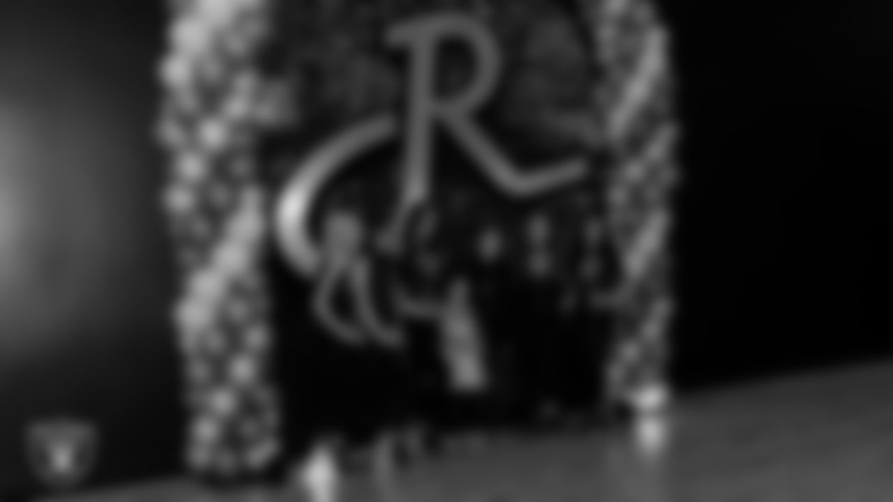 Raiderettes Delaney, Ashtin, Reagan, Lexie and Kylee pose for a photo with attendees during the Valentine's Day Dance at The Studio.