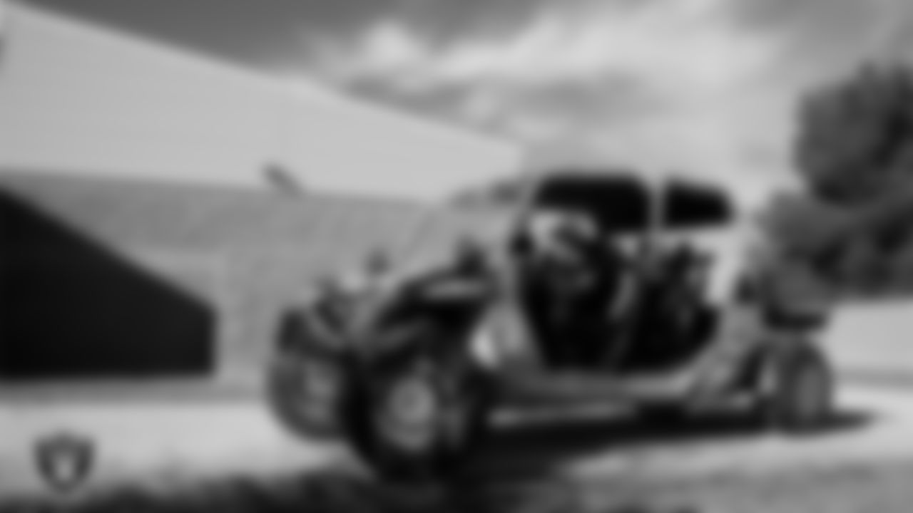 Las Vegas Raiders punter AJ Cole (6) drives a military vehicle during a tour of Nellis Air Force Base.