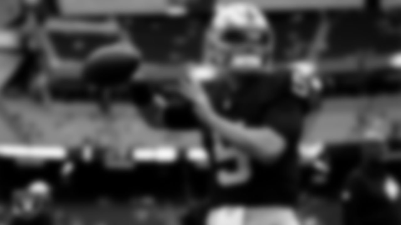 Las Vegas Raiders quarterback Cam Miller (5) warming up before the preseason home game against the San Francisco 49ers at Allegiant Stadium.