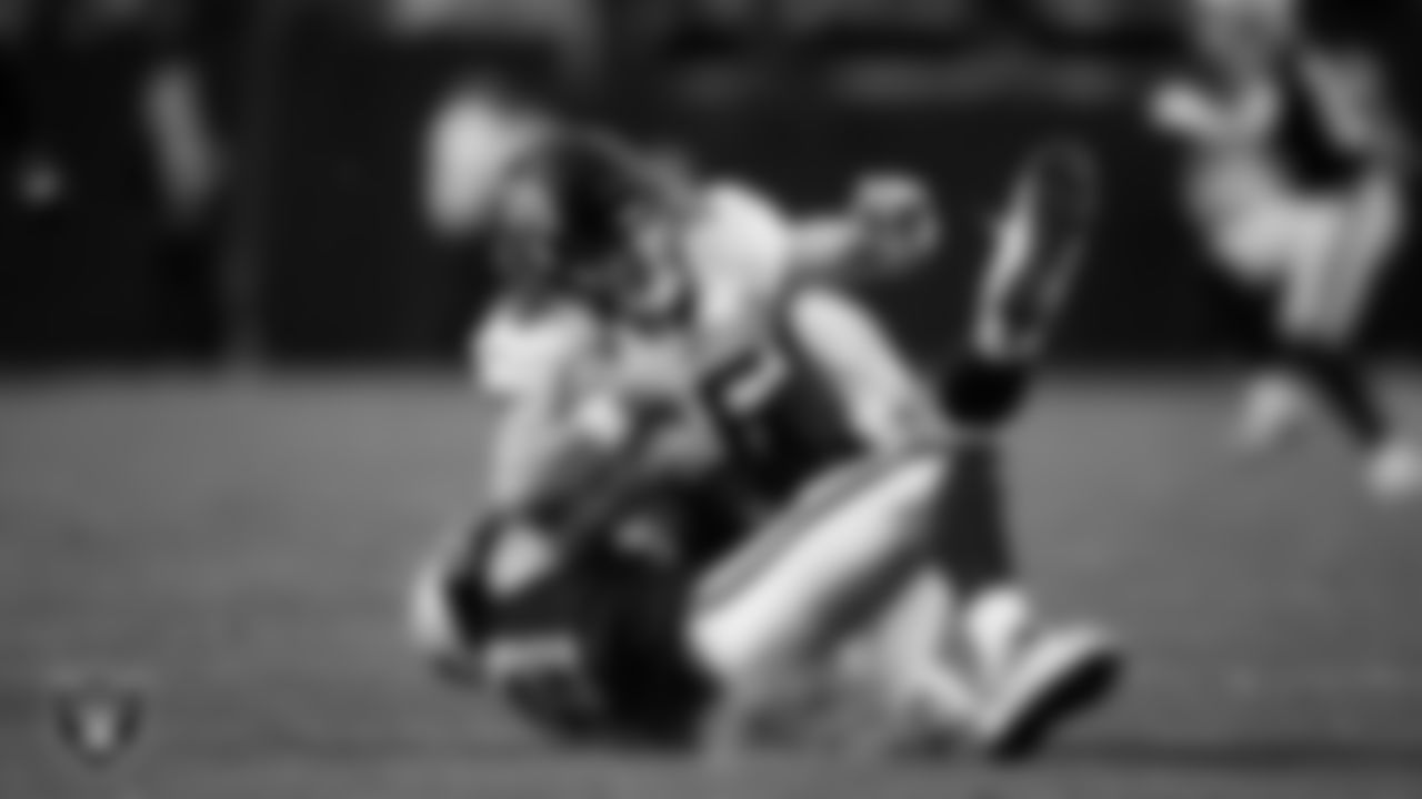 Las Vegas Raiders defensive end Maxx Crosby (98) sacks the quarterback during the regular season home game against the Jacksonville Jaguars at Allegiant Stadium.