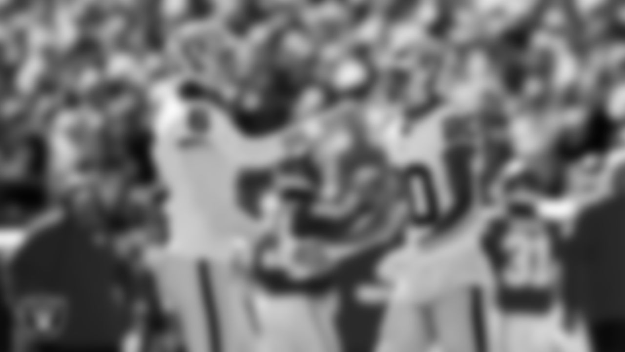Las Vegas Raiders punter AJ Cole (6) and safety Isaiah Pola-Mao (20) during the regular season away game against the Kansas City Chiefs at GEHA Field at Arrowhead Stadium.
