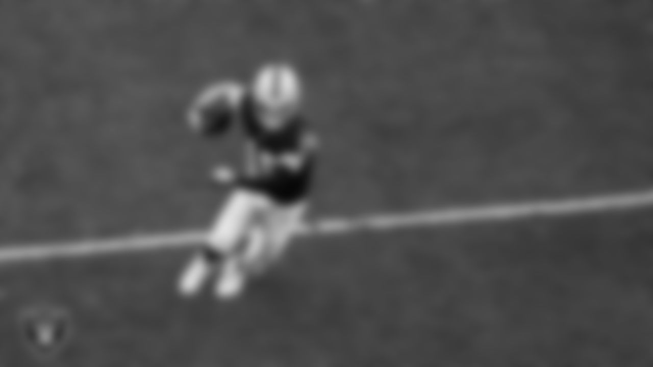 Las Vegas Raiders quarterback Kenny Pickett (15) runs during the regular season home game against the Kansas City Chiefs at Allegiant Stadium.