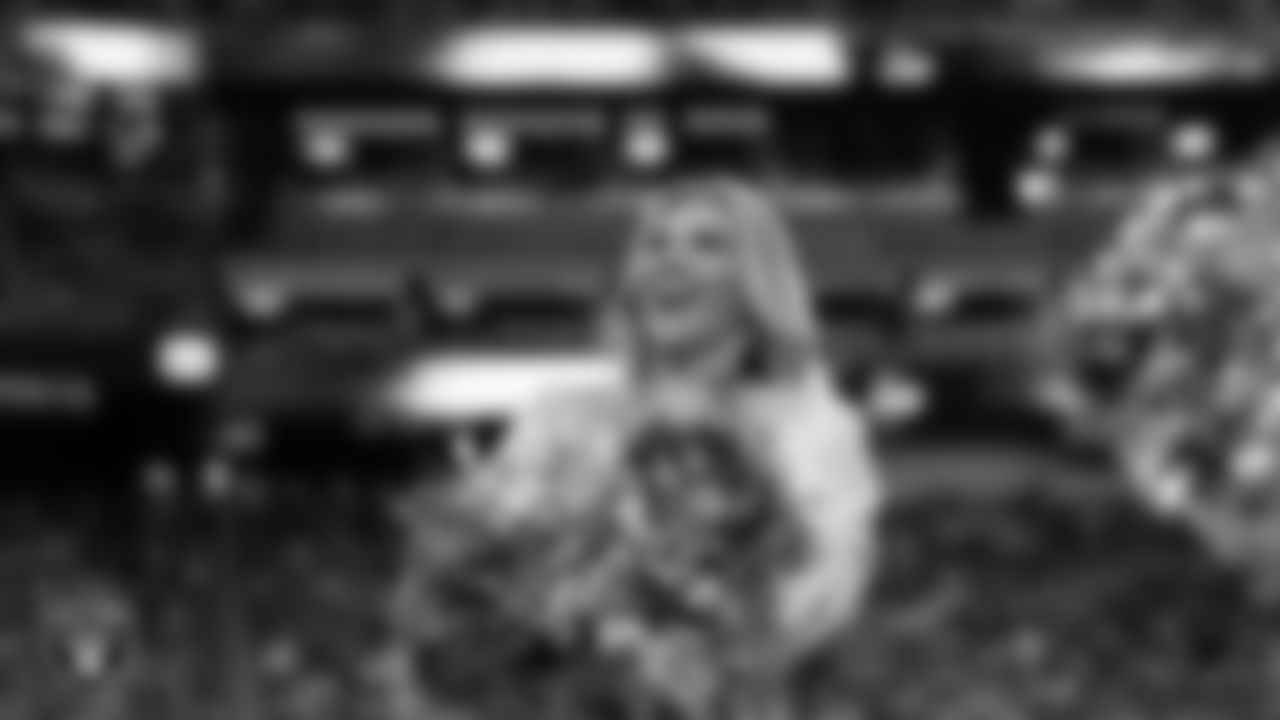 Raiderette Ali on the sidelines during the regular season home game against the Denver Broncos at Allegiant Stadium.