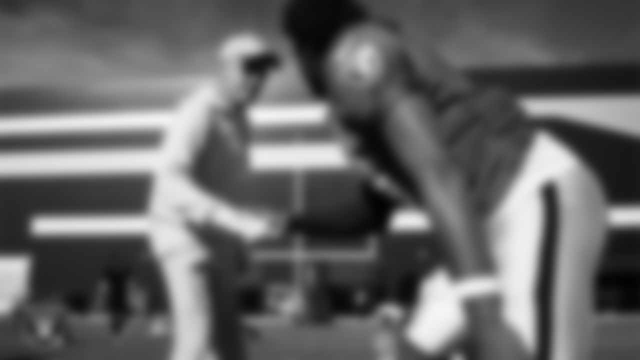 Las Vegas Raiders Head Coach Pete Carroll and quarterback Geno Smith (7) during practice at Intermountain Health Performance Center.