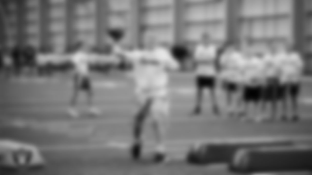 An athlete at a skills camp during Play Football Day at Intermountain Health Performance Center.