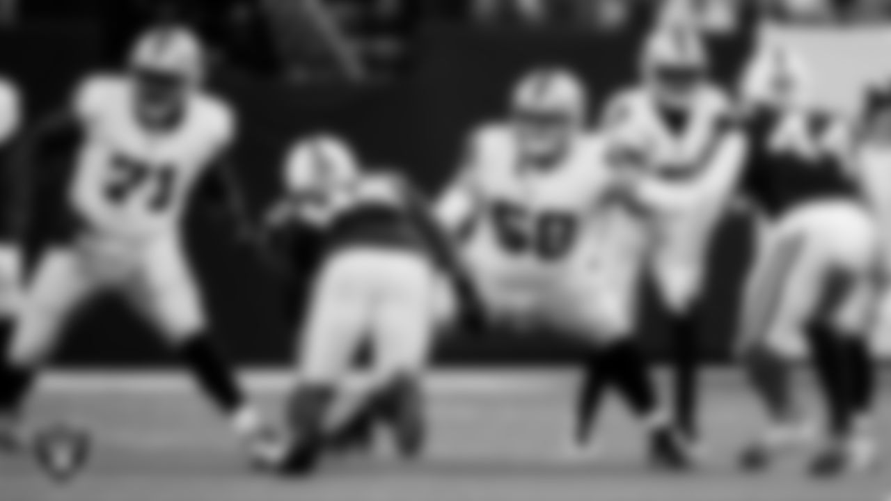 Las Vegas Raiders tackle DJ Glaze (71) and center Jackson Powers-Johnson (58) during the regular season away game against the Indianapolis Colts at Lucas Oil Stadium.