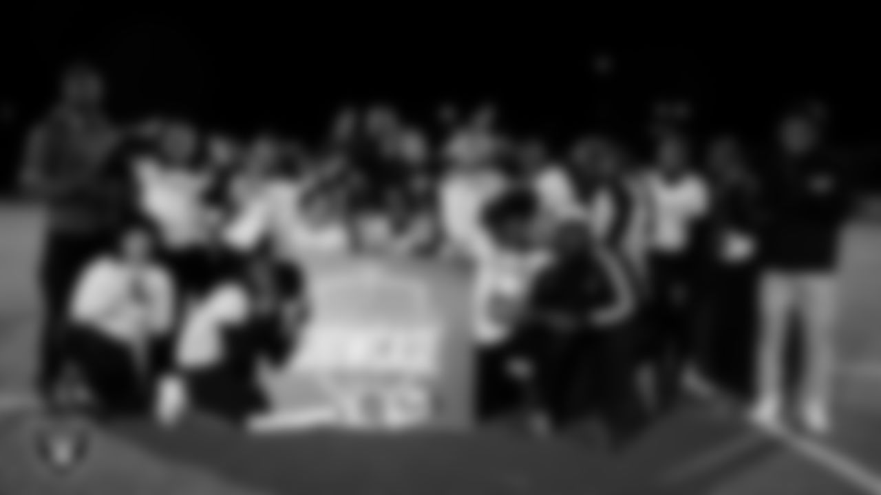 The Democracy Preparatory Academy at Agassi Campus flag football team poses for a photo after the Raiders' High School Flag Football Showcase game at Doral Academy Red Rock.