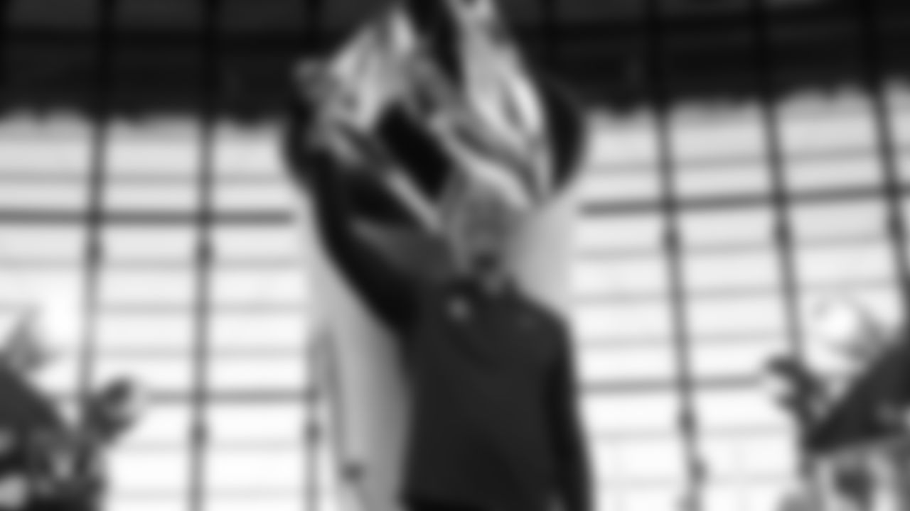 Las Vegas alumnus James Lofton lights the Al Davis Memorial Torch before the Las Vegas Raiders' regular season home game against the Cleveland Browns at Allegiant Stadium.