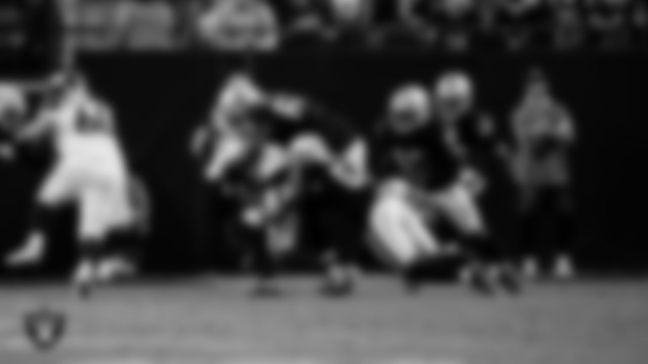 Las Vegas Raiders defensive tackle Adam Butler (69) and defensive end Malcolm Koonce (51) during the regular season home game against the Denver Broncos at Allegiant Stadium.