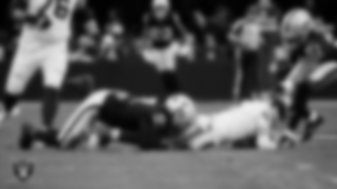 Las Vegas Raiders defensive tackle Tonka Hemingway (97) makes a tackle during the regular season home game against the New York Giants at Allegiant Stadium.