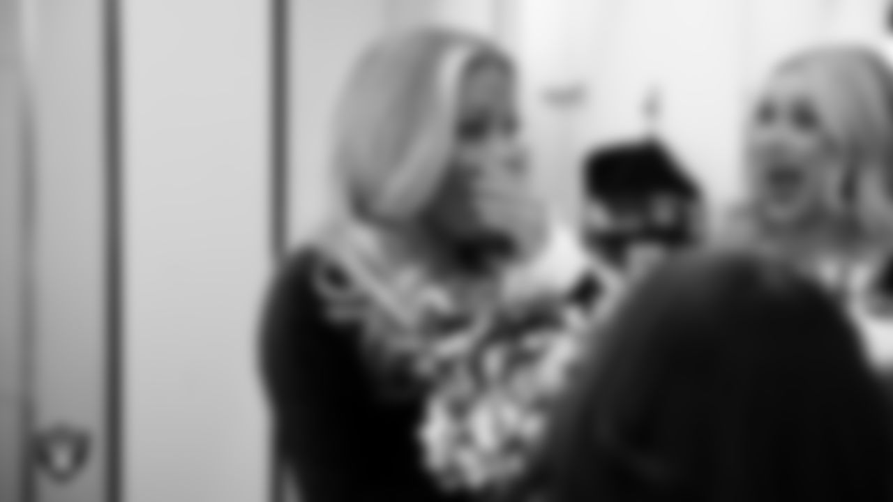 Raiderette Devyn is named Raiderette of the Game in the locker room before the regular season home game against the New York Giants at Allegiant Stadium.