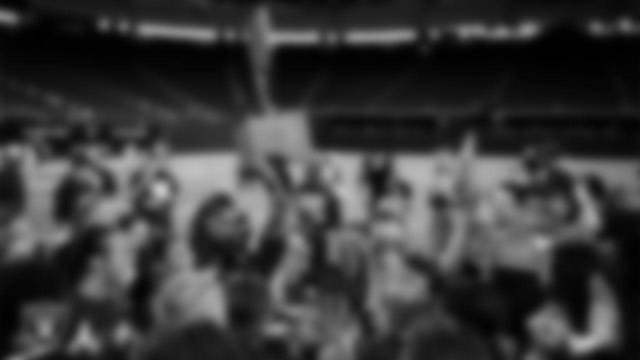 The Shadow Ridge High School flag football team celebrates after winning the NIAA 5A Flag Football State Championship game at Allegiant Stadium.