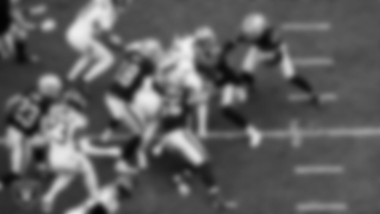 Las Vegas Raiders wide receiver Jack Bech (18), linebacker Cody Lindenberg (55) and wide receiver Justin Shorter (88) go to make a tackle during the regular season home game against the Tennessee Titans at Allegiant Stadium.