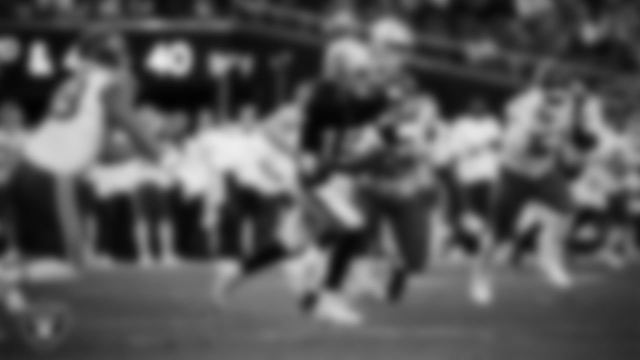 Las Vegas Raiders quarterback Kenny Pickett (15) runs during the regular season home game against the Kansas City Chiefs at Allegiant Stadium.