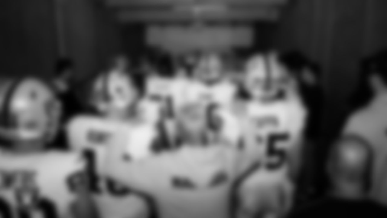 The Las Vegas Raiders wait to be introduced onto the field before the regular season away game against the Houston Texans at NRG Stadium.