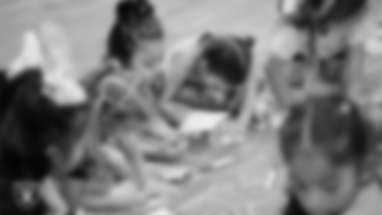 Dancers color during day one of summer camp at The Studio.