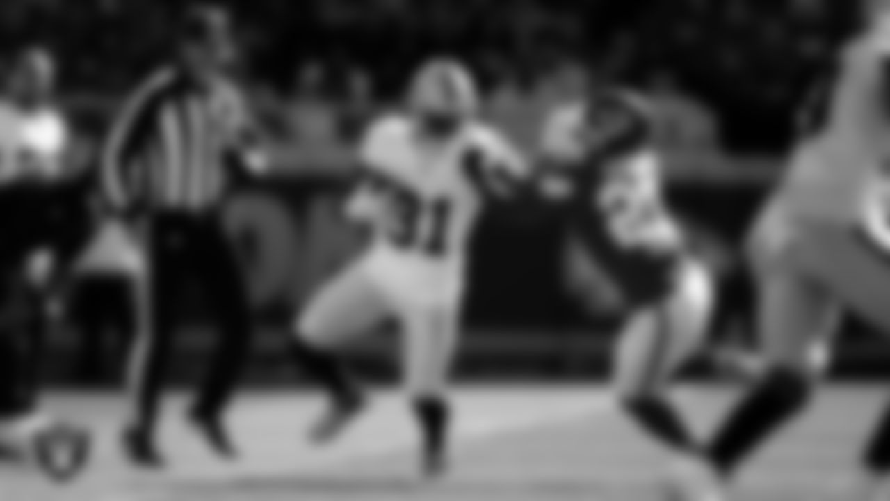 Las Vegas Raiders running back Raheem Mostert (31) runs after making a catch during the regular season away game against the Kansas City Chiefs at GEHA Field at Arrowhead Stadium.
