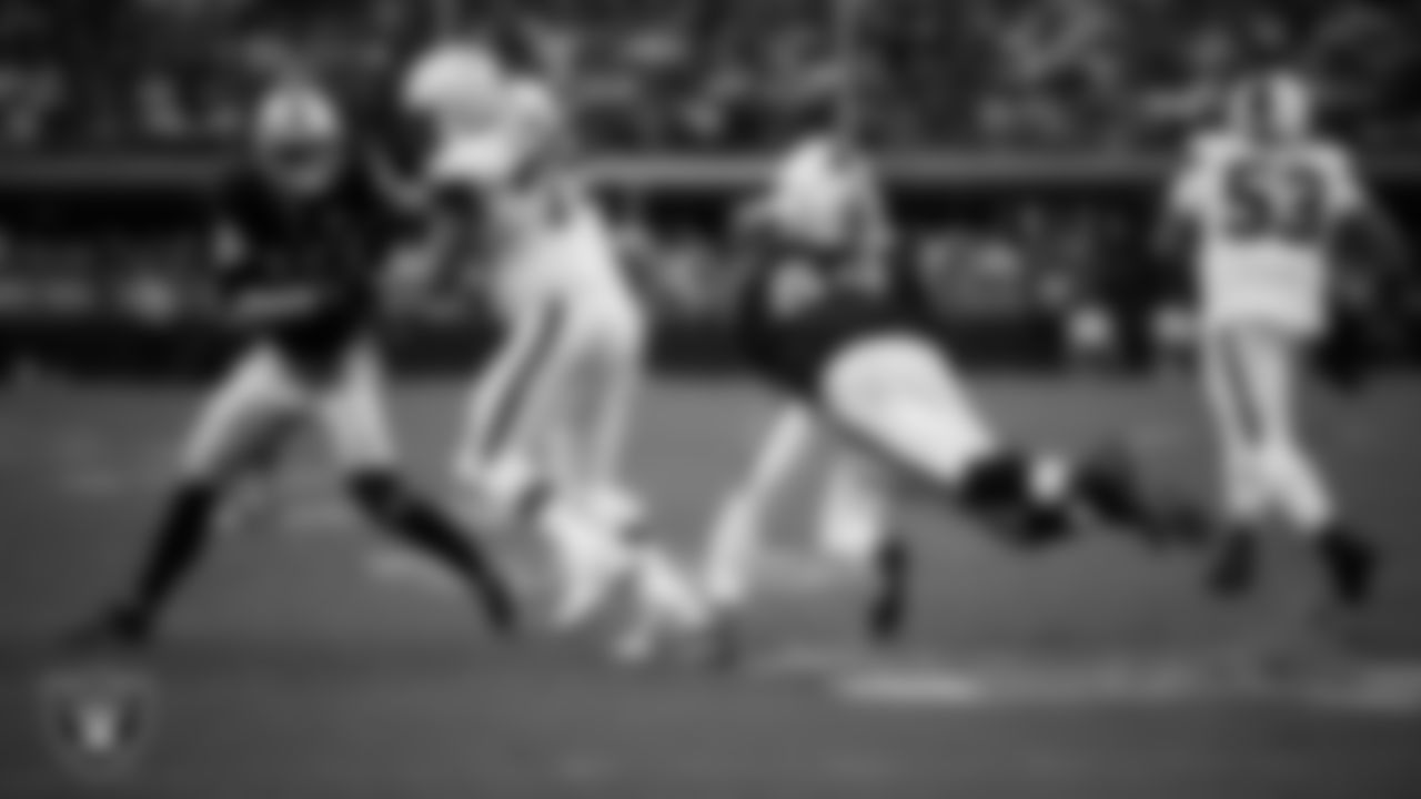 Las Vegas Raiders defensive lineman Adam Butler (69) makes a tackle during the regular season home game against the Cleveland Browns at Allegiant Stadium, Sunday, September 29, 2024, in Las Vegas, Nev.