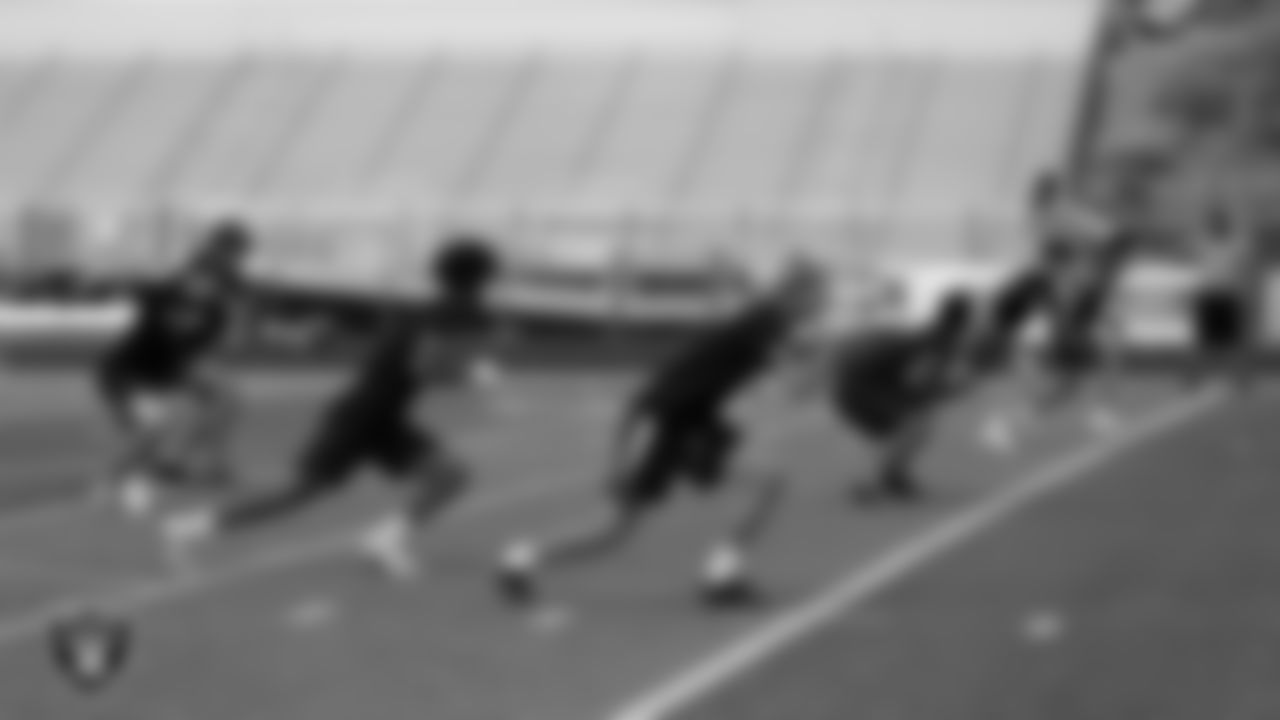Athletes compete in a 7-on-7 game during a Las Vegas Raiders 11-ON event at Damonte Ranch High School.