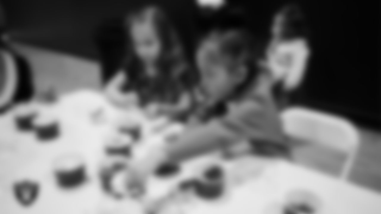 Junior Raiderettes enjoy activities during the Junior Raiderettes Banquet at The Studio.