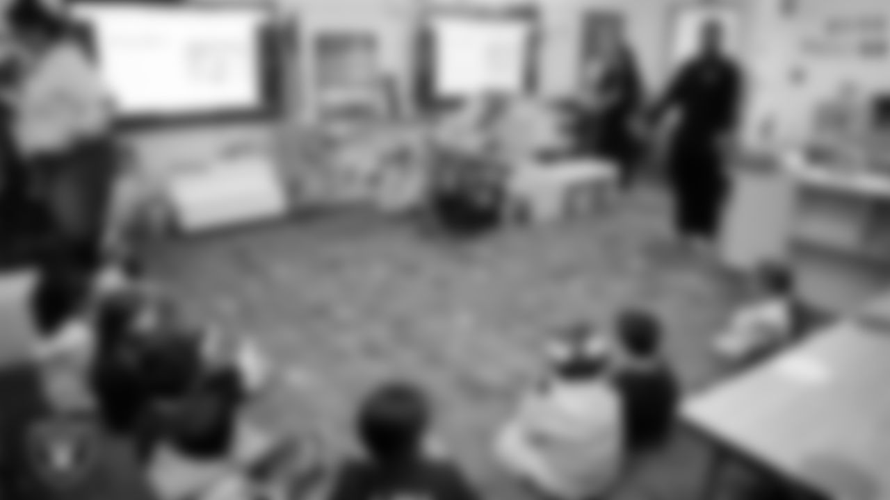 Las Vegas Raiders coordinator of football development Chris Shelby visits students at Richard H. Bryan Elementary School to congratulate them on winning the Lil' Raiders School Challenge.