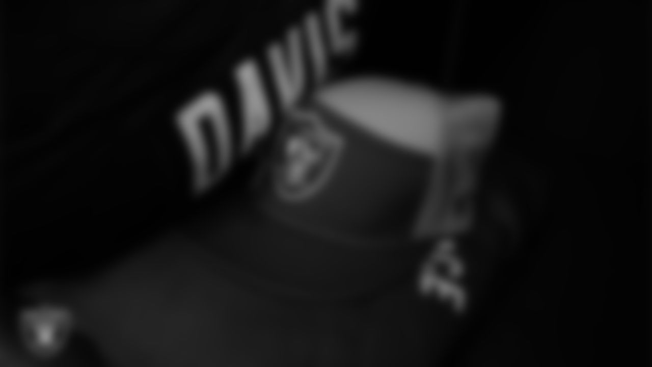 A Las Vegas Raiders Salute to Service hat in the locker room prior to the Raiders' arrival for their regular season home game against the Dallas Cowboys at Allegiant Stadium.