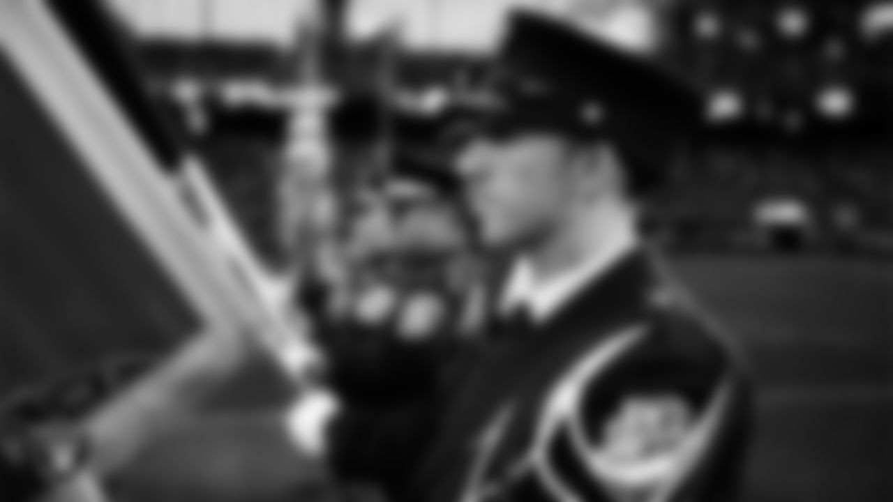 Nevada First Responders present the nation's colors during the national anthem before the Las Vegas Raiders' regular season home game against the New York Giants at Allegiant Stadium.