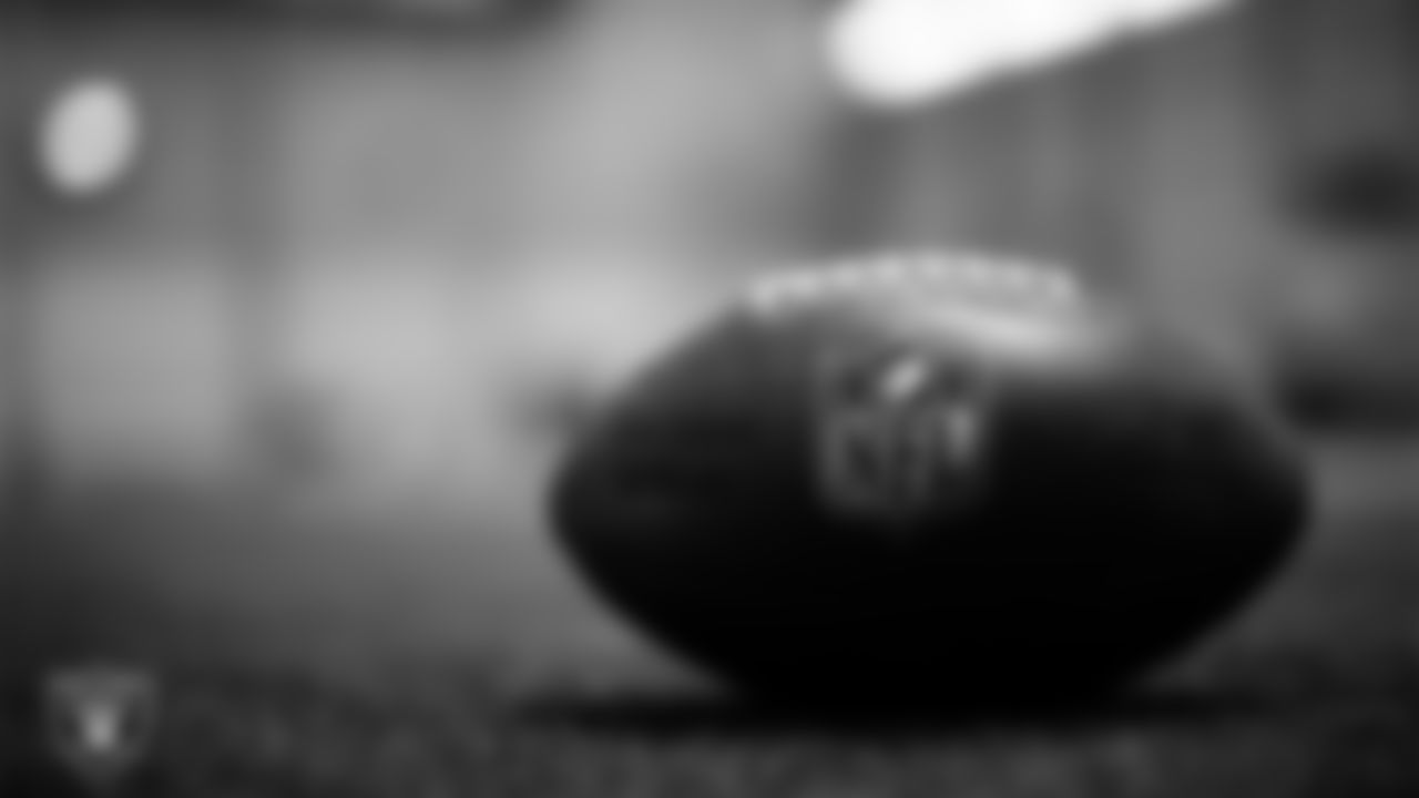 A football on the field at a workout during phase two of the offseason program at Intermountain Health Performance Center.