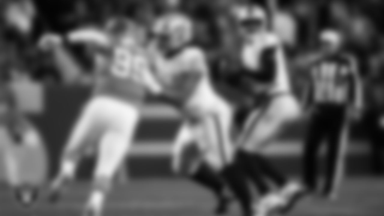 Las Vegas Raiders guard Dylan Parham (66) blocks during the regular season away game against the Denver Broncos at Empower Field at Mile High.