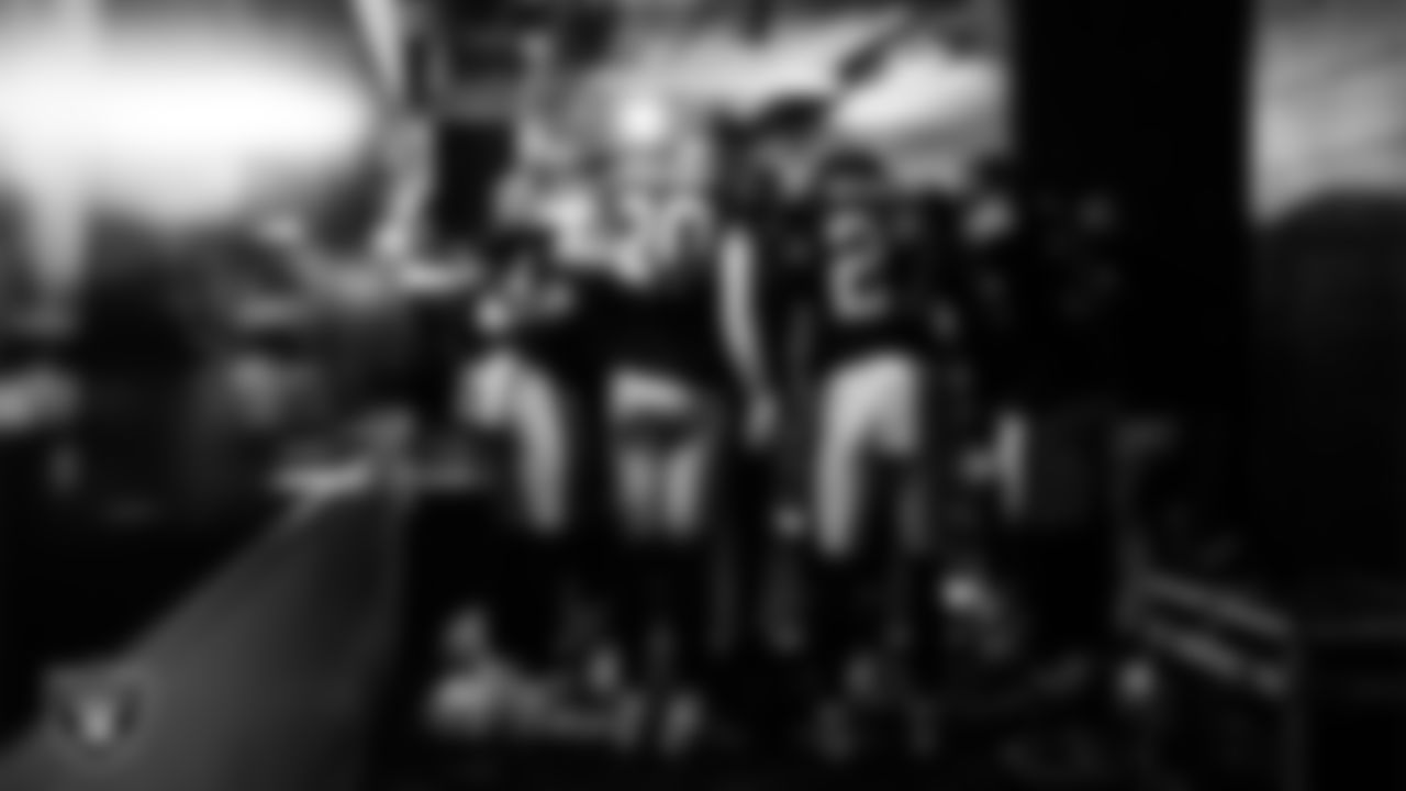 The Las Vegas Raiders defensive backs huddle in the tunnel before the regular season home game against the Cleveland Browns at Allegiant Stadium.